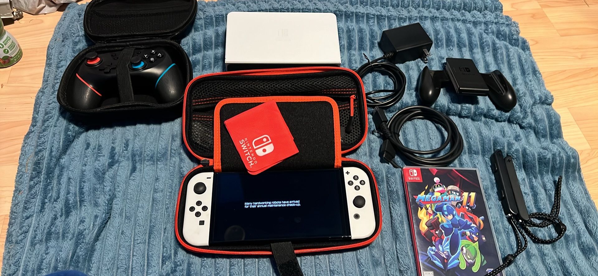 NINTENDO SWITCH OLED WITH DOCKING STATION, EXTRA CONTROLLER, MEMORY CARD & MEGAMAN 11