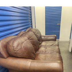 Comfy Leather Couch (free delivery)