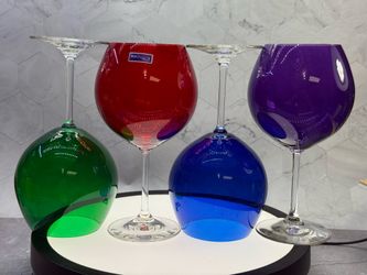 Set of (4) Marquis by Waterford Vintage Jewels Aromatic Balloon Wine Glasses in assorted colors. Four glasses with rich-colored bowls in cobalt blue, 