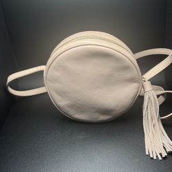 Mark Graham Blush Champagne Colored Leather Circle Crossbody Purse Fringed Tassel Pull