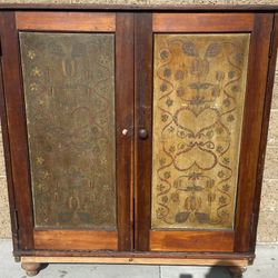 Antique pie safe,  used in 19th-century American households to store baked goods