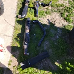 Complete Black Exhaust For A Victory Cross Country