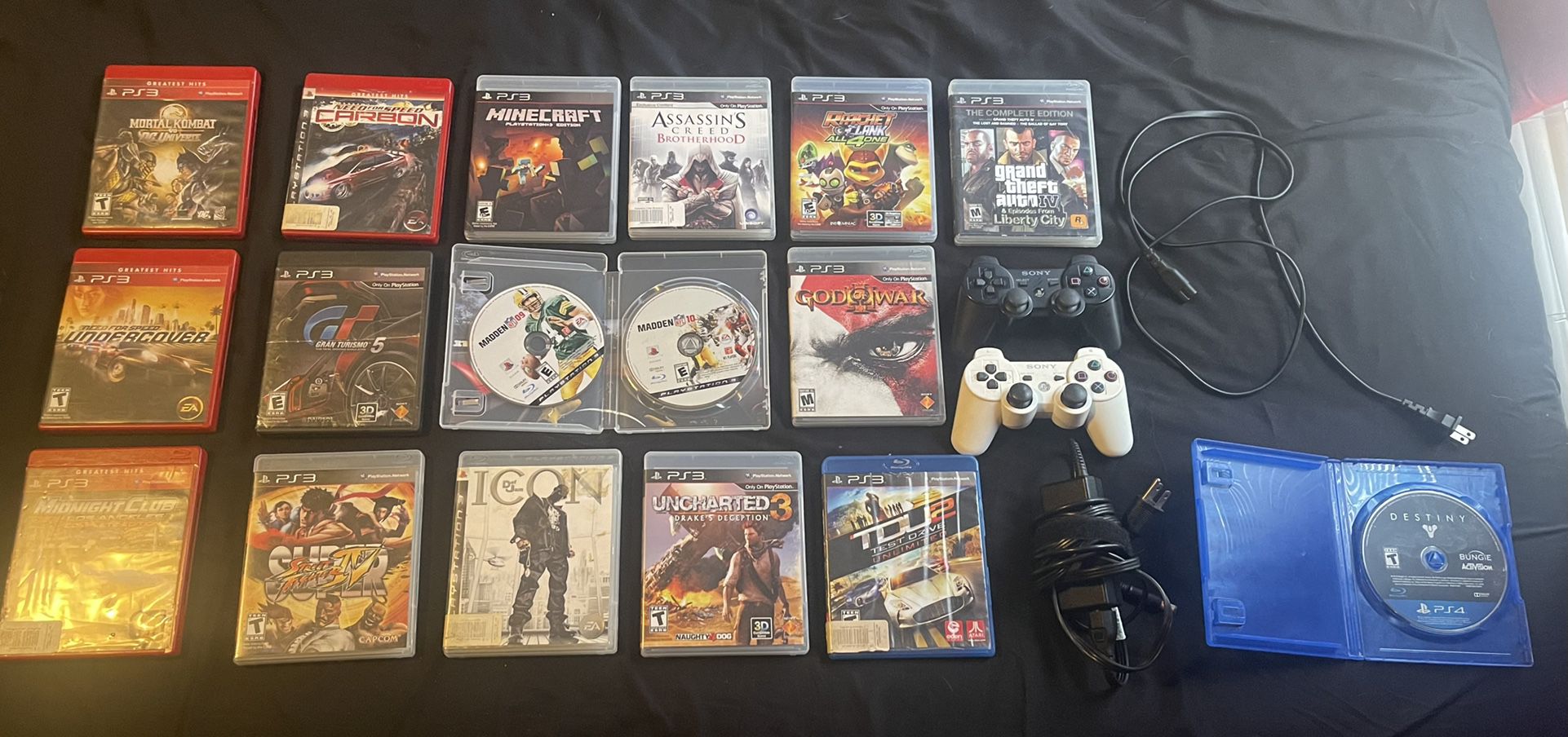 17 PlayStation 3 dis games + Both black and white controllers with power cord and HDMI Cord 