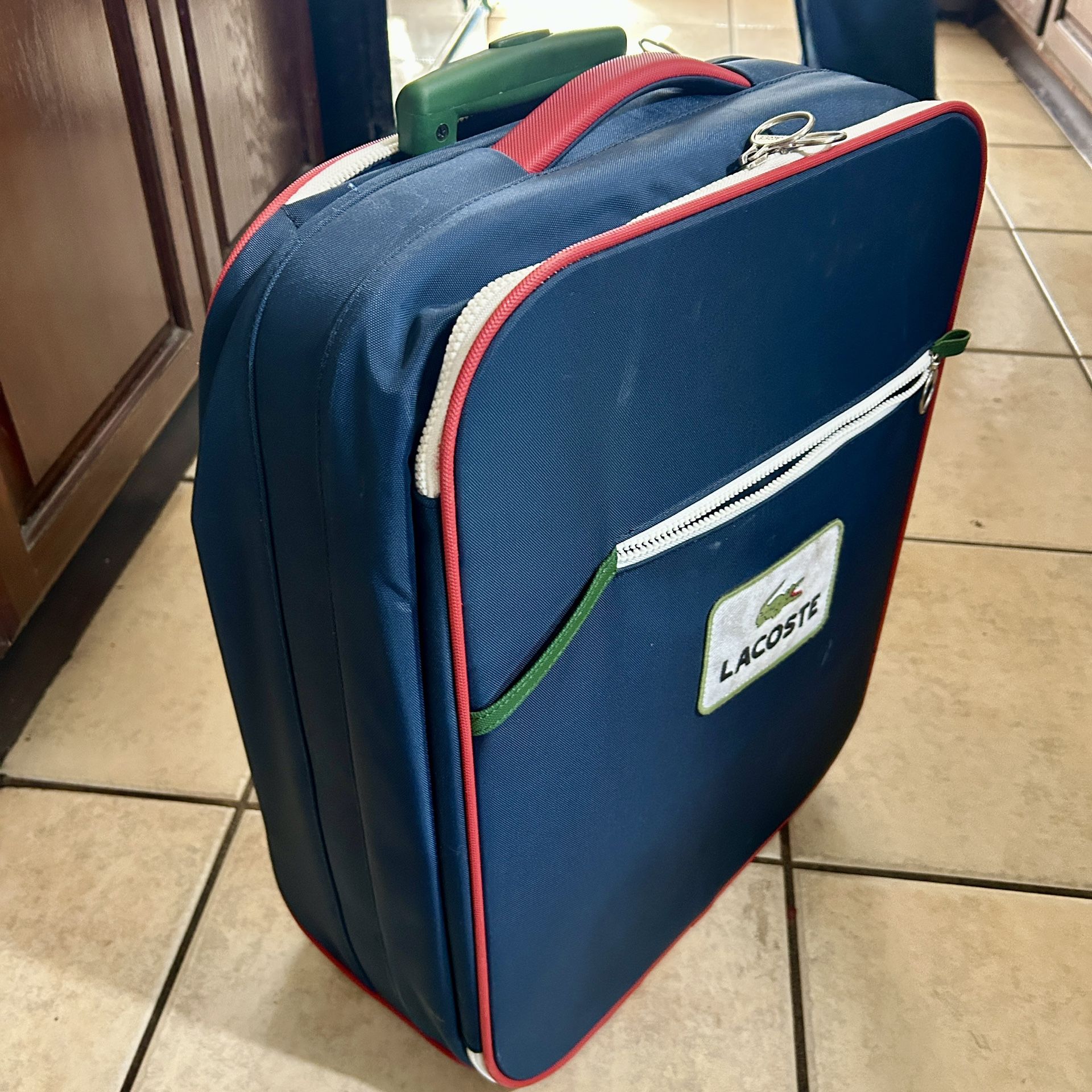 Lacoste 20.5” Rolling Luggage Case With Extendable Handle