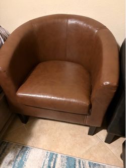 Pair of sofa chairs with leg rest