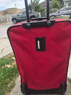 Red small luggage bag