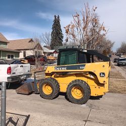 Deere 328 Skid Steer - 2015