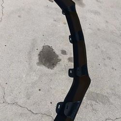 Car wind deflector for a Chevy Avalanche
