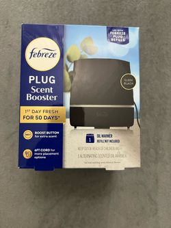 Febreze PLUG Scent Booster starter kit in sleek black