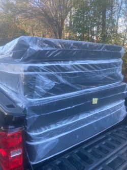 Queen Pillowtop Mattress and box spring new in plastic free delivery in Atlanta