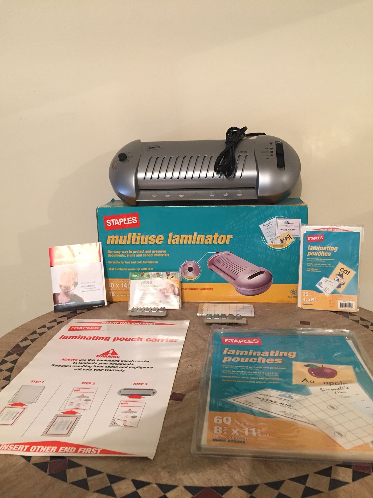 Laminator, multi use. Staples brand, model #LM1910. Works like new, used only 2 times. Has multiple laminating sheets for full size documents and bu
