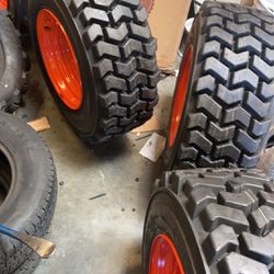4x bobcat tires 12-16.5 with 4 rims $1900 cash no bargain price firm