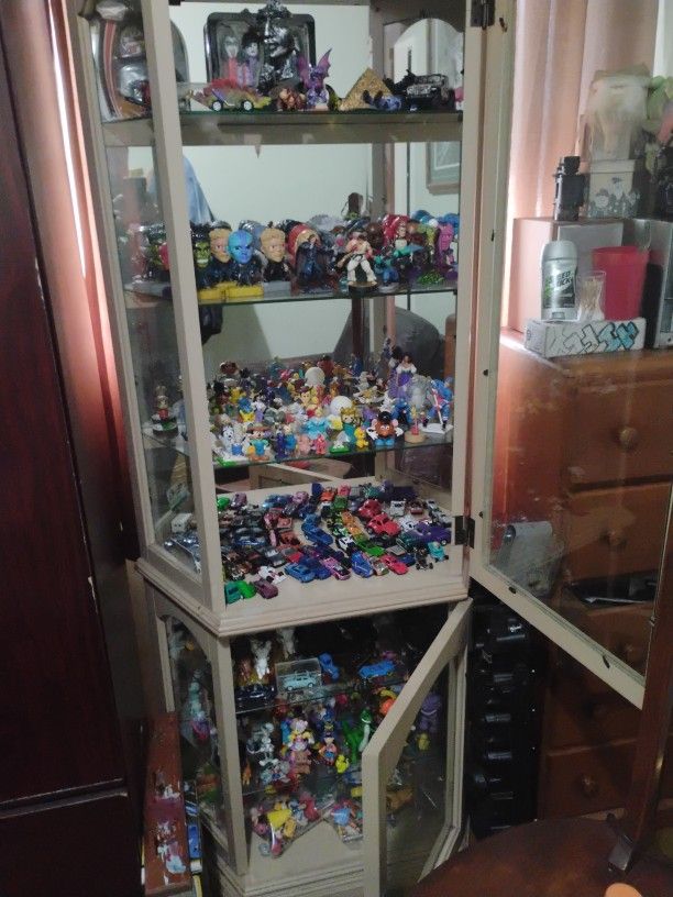 I Got A Cabinet Full Of Walt Disney Cartoon Characters Action Figures McDonald's Action Figures Hot Wheels