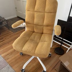 comfortable yellow rolling desk chair