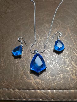 Sterling silver 925 stamped  and Brazilian blue topaz pendant and earrings set.