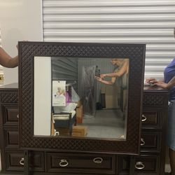 Dark brown dresser with mirror $180