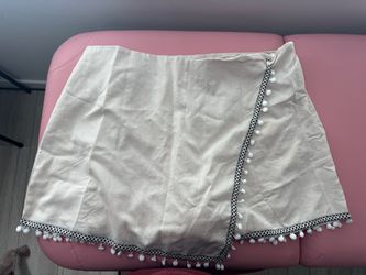 Two cream boho skirts