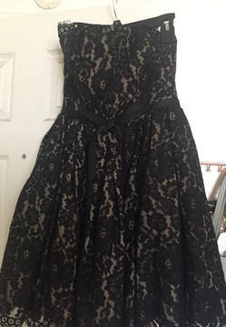 Beautiful size 6 blank lace dress used once