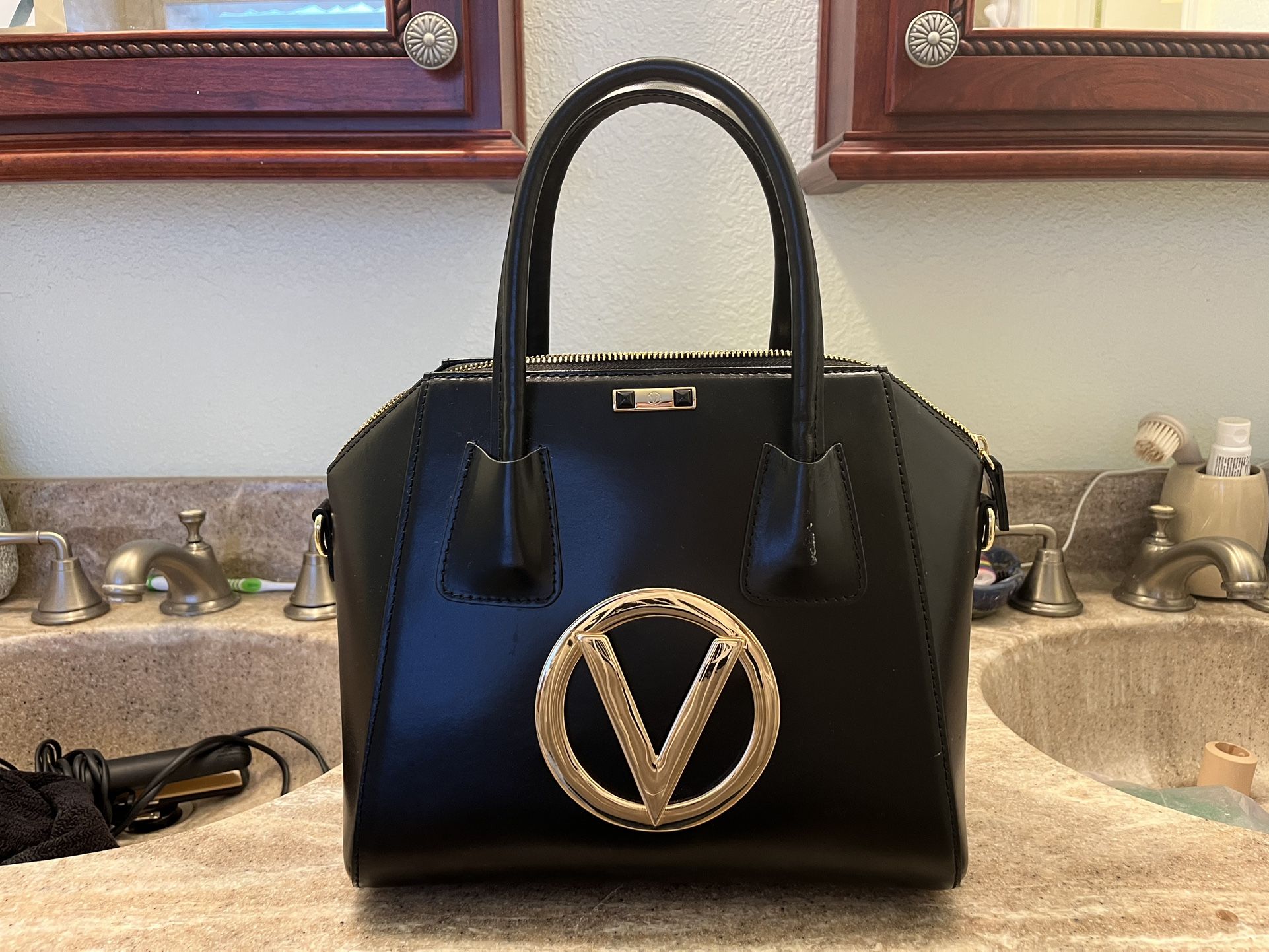 Valentino $300