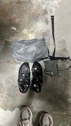 Rock climbing harness, shoes, and chalk bag