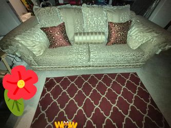 Luxury gold two-piece sofa set with rich burgundy and gold accent pillows. Sofa approximately 98"×38". Loveseat approximately 72"×38".