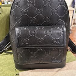 Black Gucci Embossed Backpack 