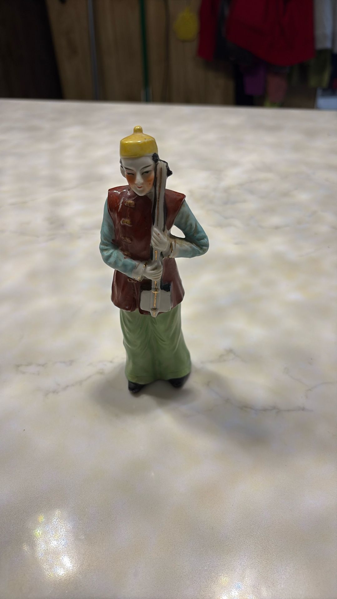 Vintage Japanese man holding an instrument