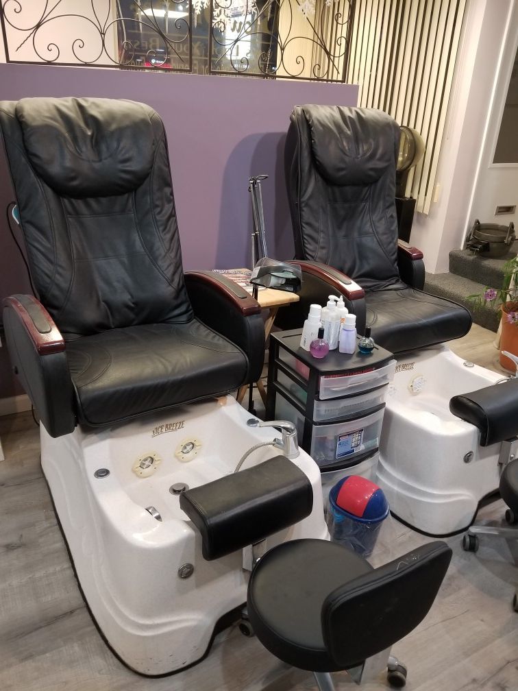 2 pedicure chairs