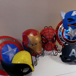 Lot of 7. Five Marvel Super Hero Masks and Two Captain America shields