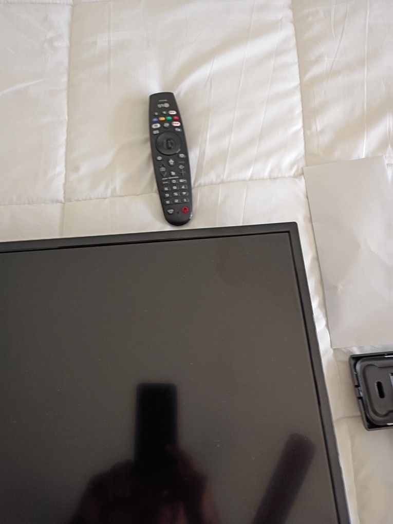 A 40-in TV With The Brackets To Put On The Wall