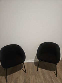 2 Black Boucle lounge chairs