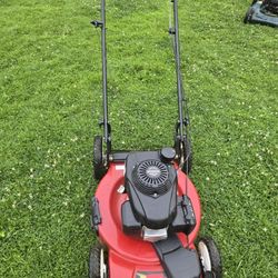 Lawn mower for sale. Excellent working condition, lightly used, Hyundai logo.