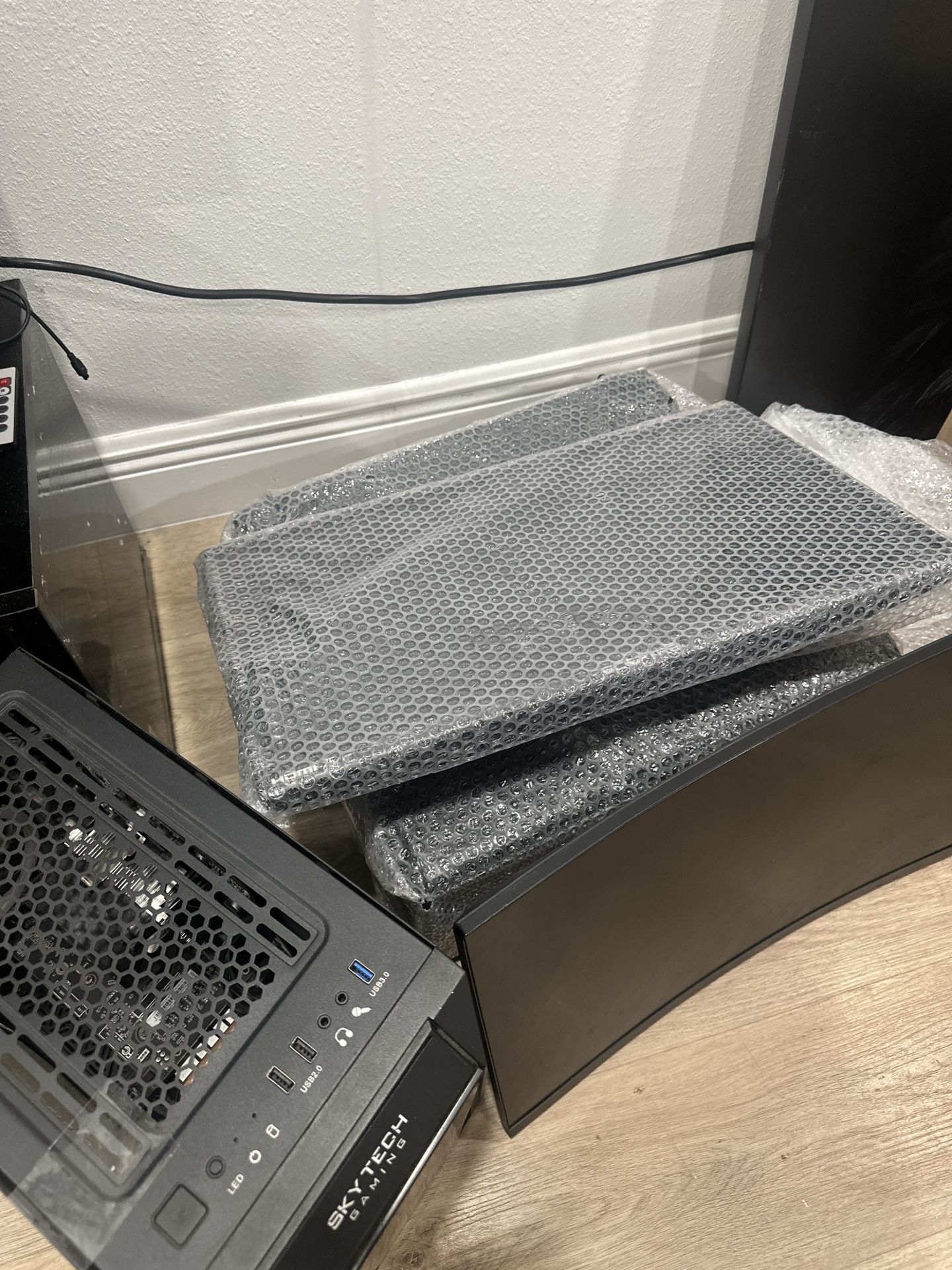 2 Pc Monitors 2 Of The Pc Box Things And A Box Filled With Cables For It
