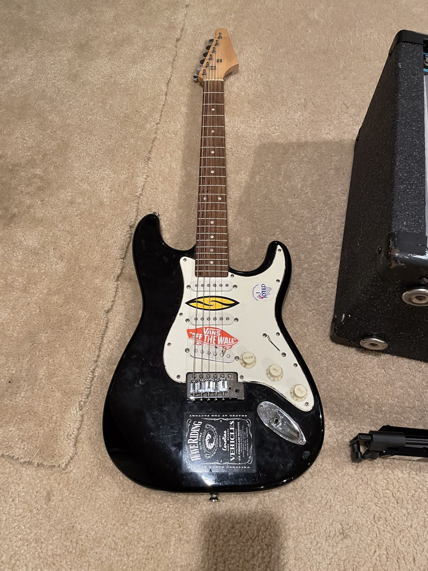 Squier Stratocaster Electric Guitar and Peavy Bandit 112 Amp