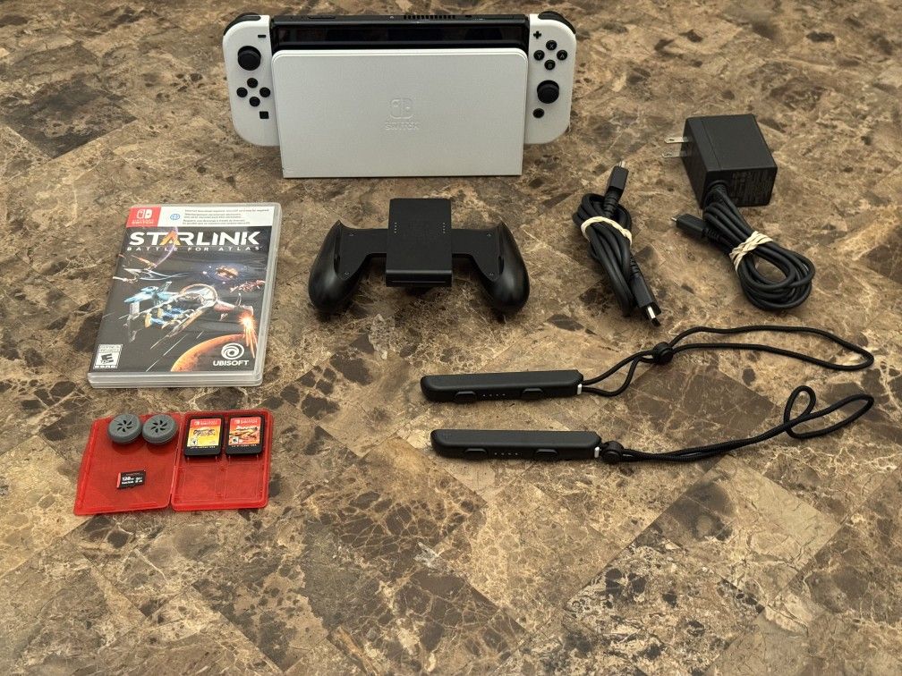 Nintendo Switch OLED - White - Excellent condition. Come with 3 games + 128 GB Micro SD card