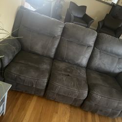 Ashely’s Furniture Dark Grey Couch