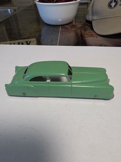 Vintage Green die casts car.