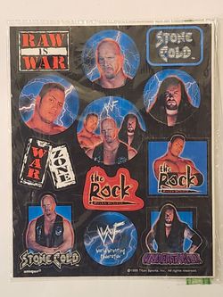 VINTAGE 1999 TITAN SPORTS. UNIQUE. WWF STICKER SHEET.  5 " X 6 1/2 " .