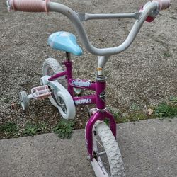 Girls Huffy 12 In Bike With Training Wheels