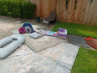 Various Rugs And Throw Pillows