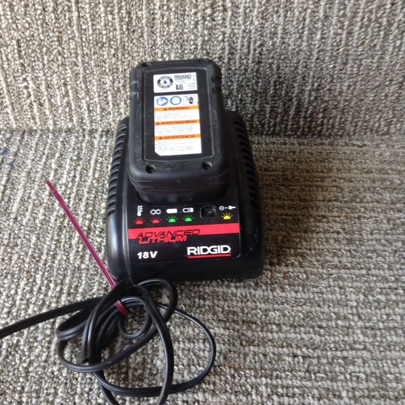 Ridgid 18 V battery and charger for a plumbing crimping tool