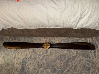 71 inches propeller wall art model. Brass covers on the ends