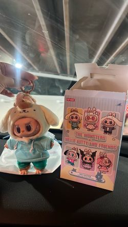 The Monsters x Hello Kitty and Friends Pompompurin Labubu