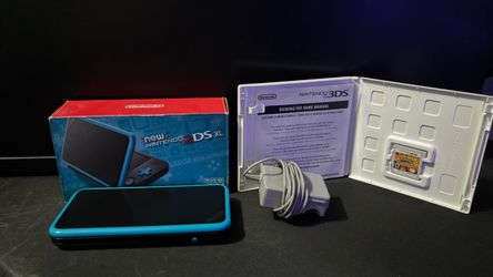 Nintendo 2DS XL in Black Turquoise W/Original Box, 64GB, & Pokemon Ultra Sun.