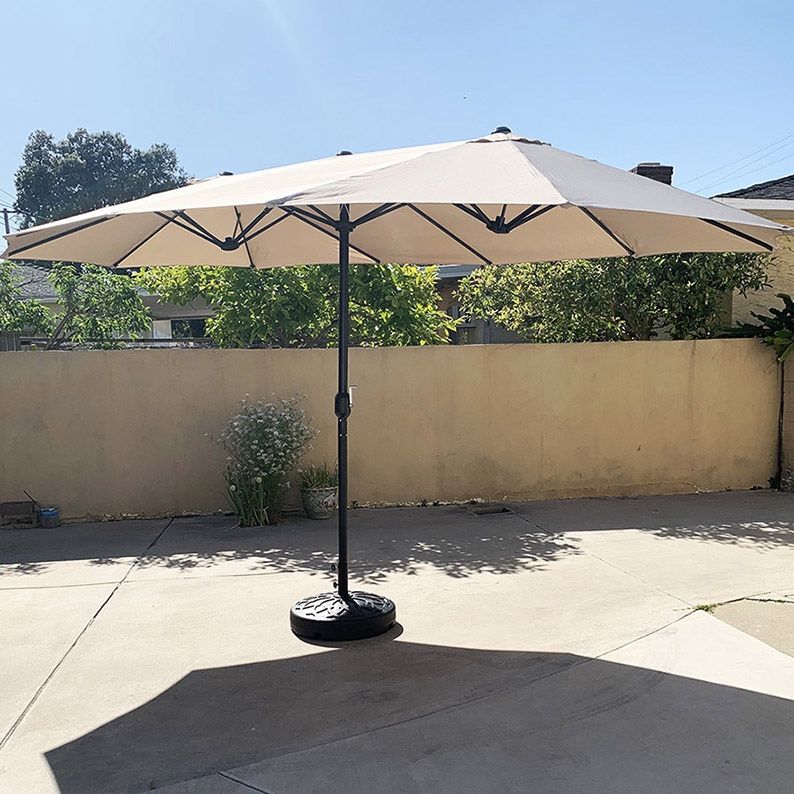 New in box $130 Large 15 FT Double Sided Outdoor Umbrella with 65 LBS Plastic Weight Base (Beige color) 