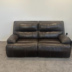 Leather Automatic Reclining Loveseat – 82” x 44” x 40”