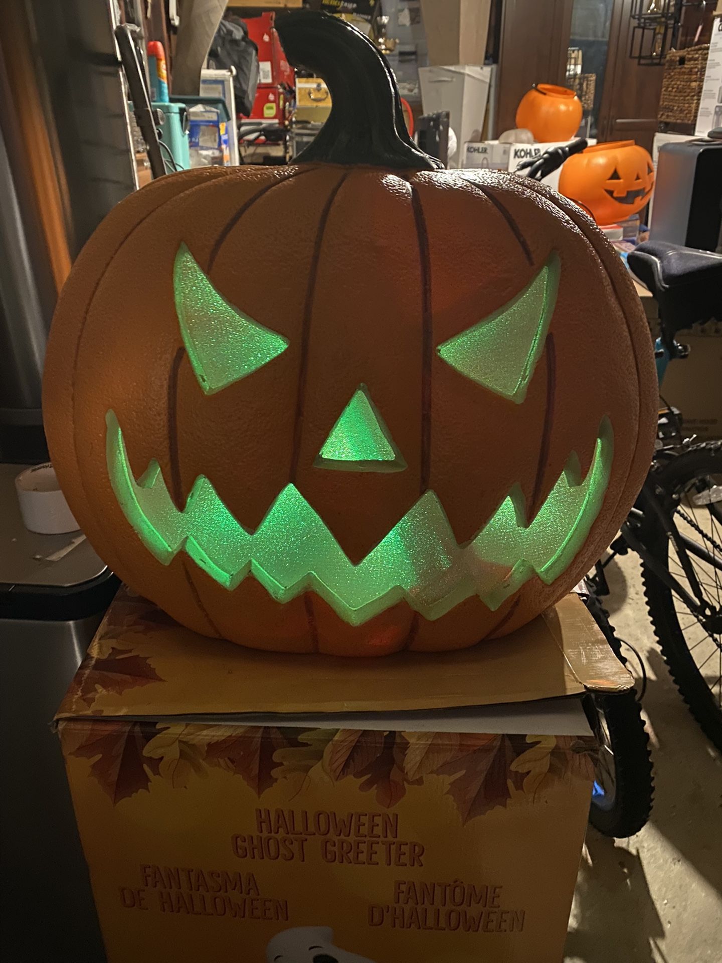 Halloween pumpkin with multi-colored flickering leb lights