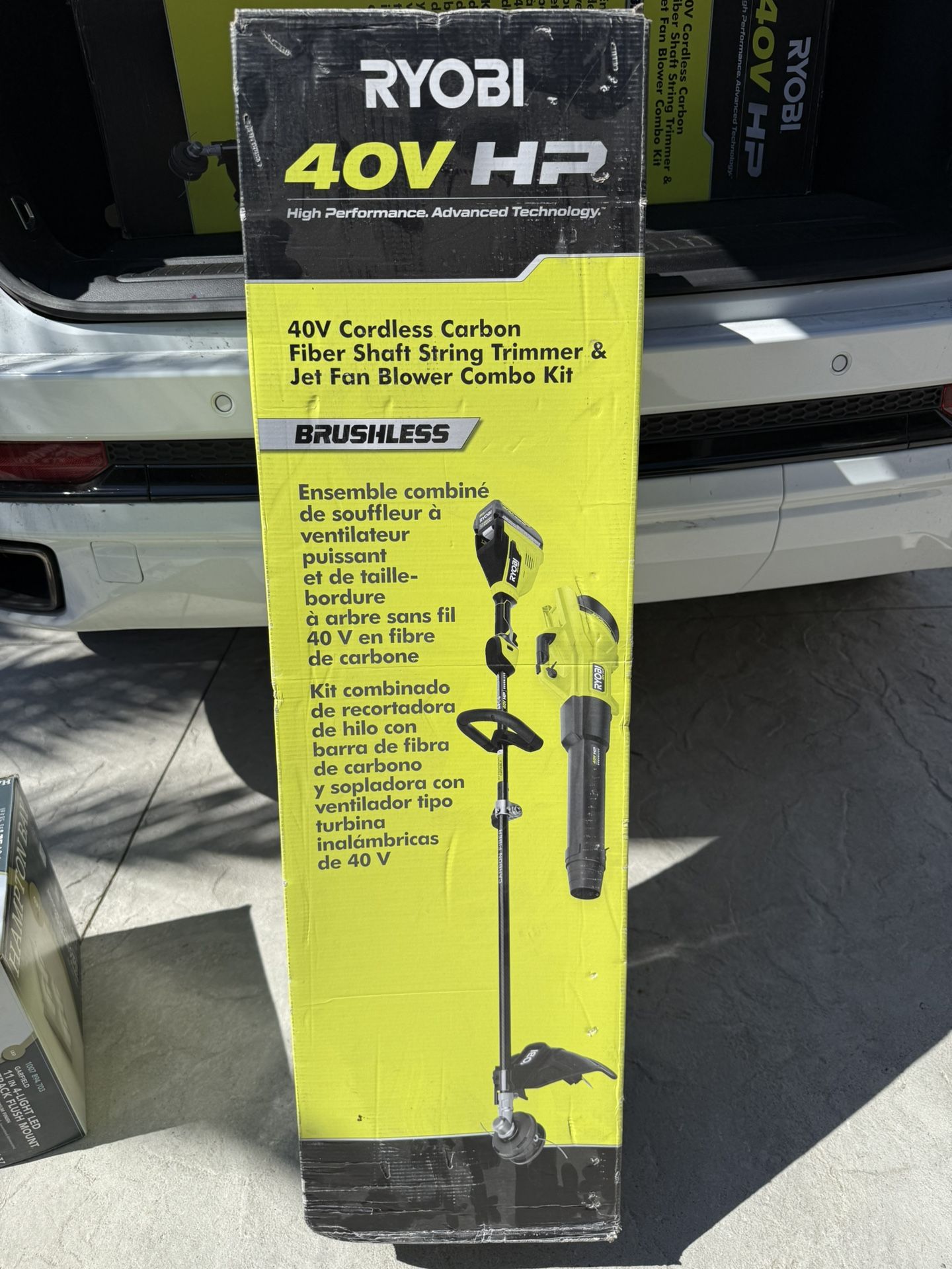 RYOBI 40V HP Brushless 600 CFM 155 MPH Cordless Leaf Blower and Carbon Fiber String Trimmer with 4.0