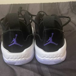 Purple/silver/black Jordan’s