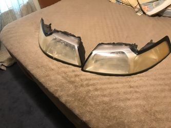 00-04 mustang stock headlights